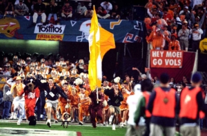 Greene, far left, helps lead the charge as Tennessee takes the field. Patrick Murphy-Racey Photography/pmrphoto.com